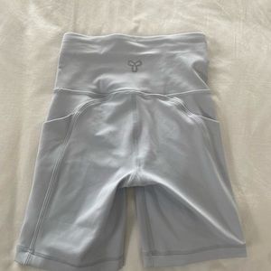 TNA aritzia baby blue biker shorts